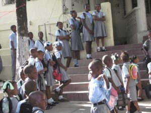 Students Standing on the Steps