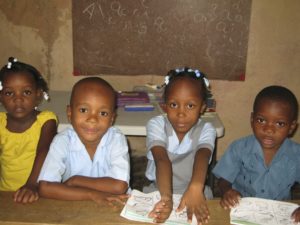 Four Young Kids in Class